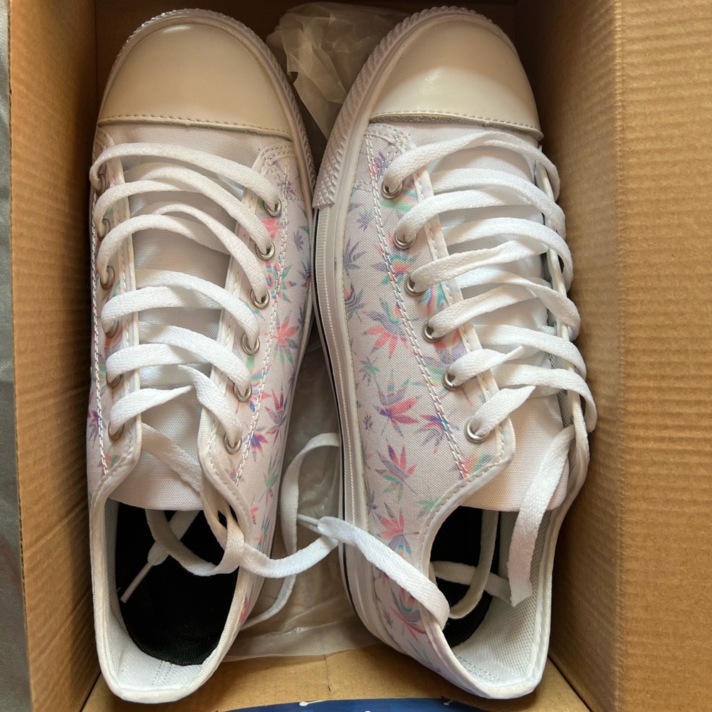 customized Converse sneakers with marijuana leaves